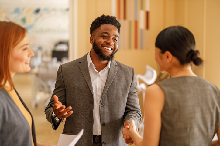 CRE advisors discuss business and are proud to be a part of the best real estate brokerage to work for