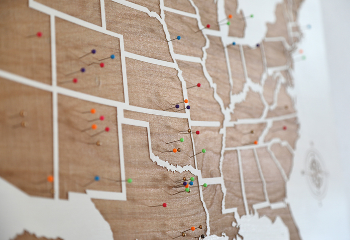 U.S. map with markers across several states, representing the local commercial real estate expertise needed for multi-state portfolios